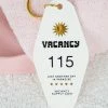 Vacancy Supply - Room 115 Keyring - White -Accessories Shop b1a60e5b83834f768dcda02c391a8679 1024x1024